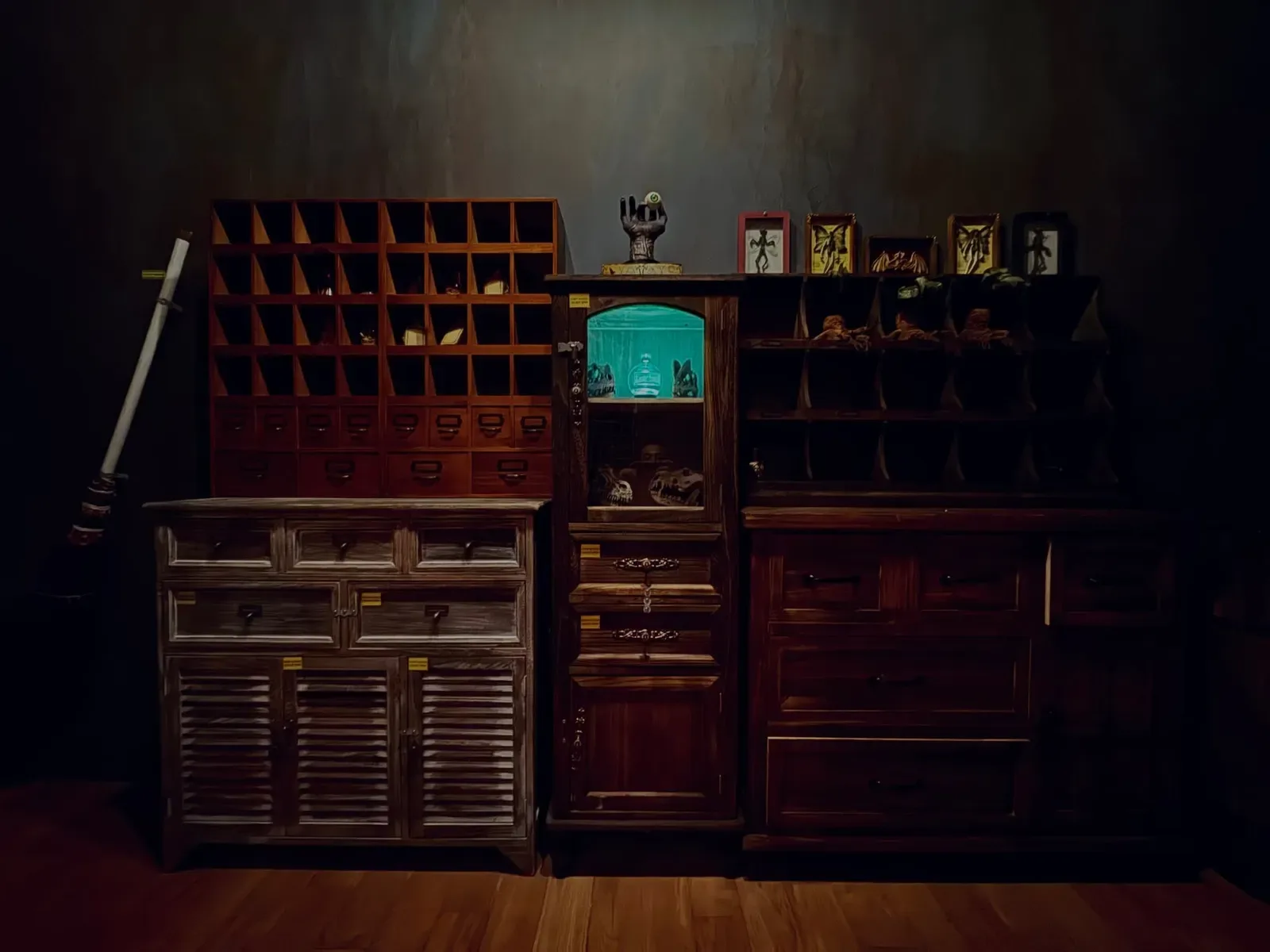 A built escape room set at Lockdown Marina Square — shelves, props and lamplight