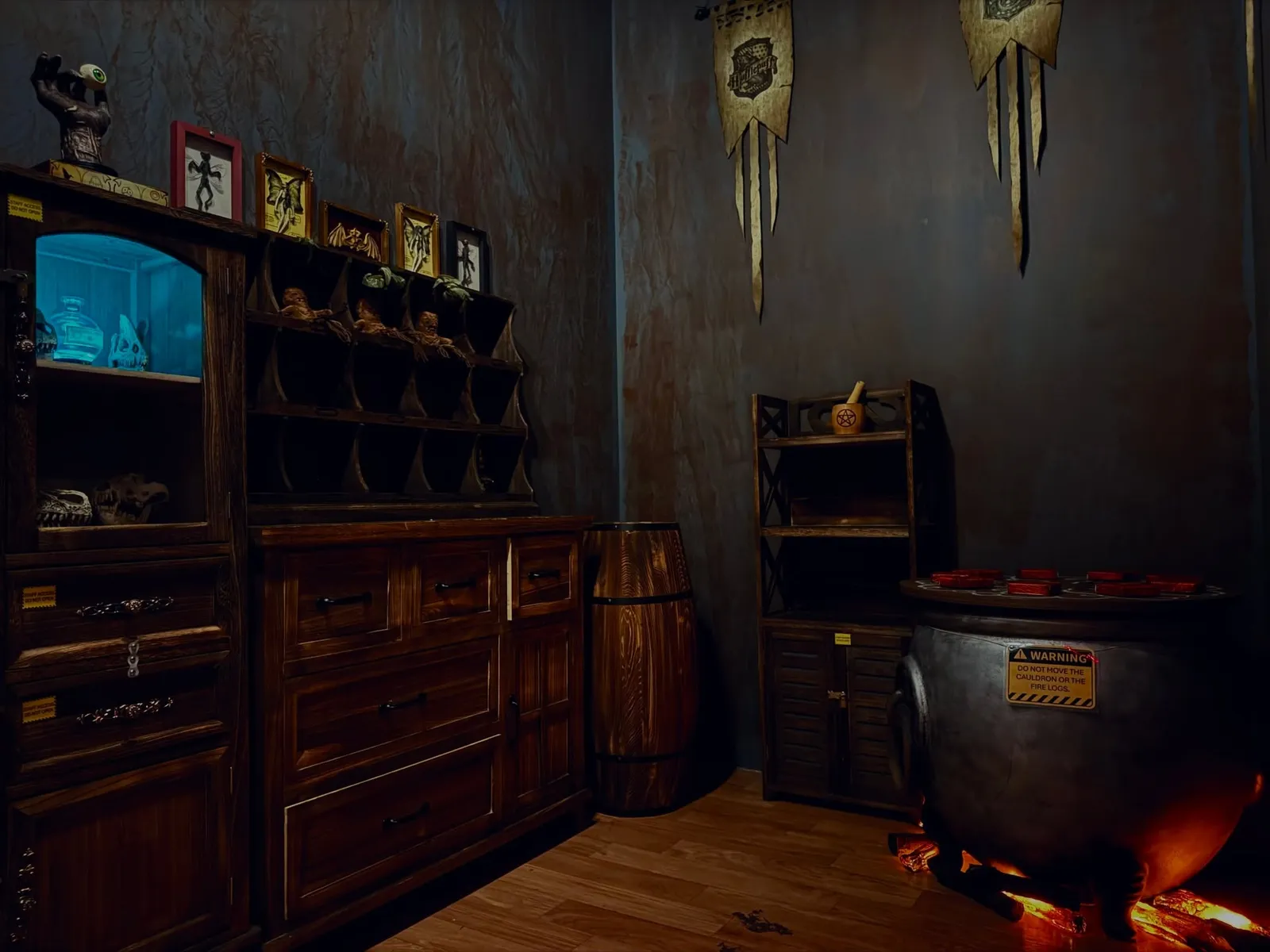 The lamplit study set inside the Bearry Potter and the FireStorm Guardian escape room at Marina Square